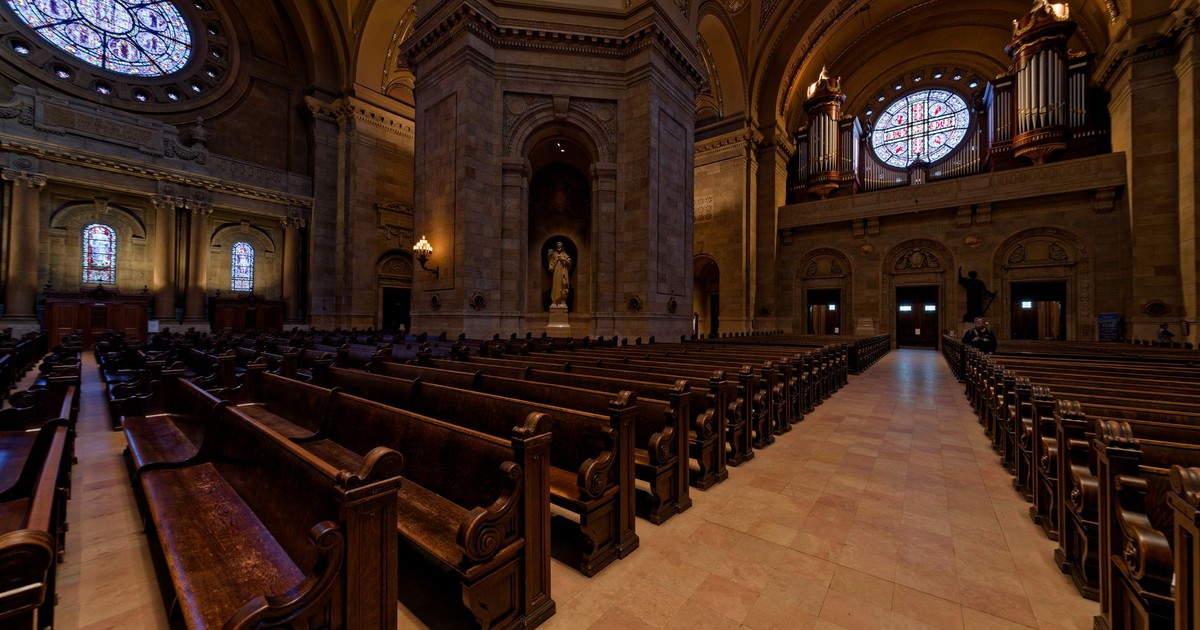Rich architectural features and stained glass windows inside Saint Paul Cathedral.