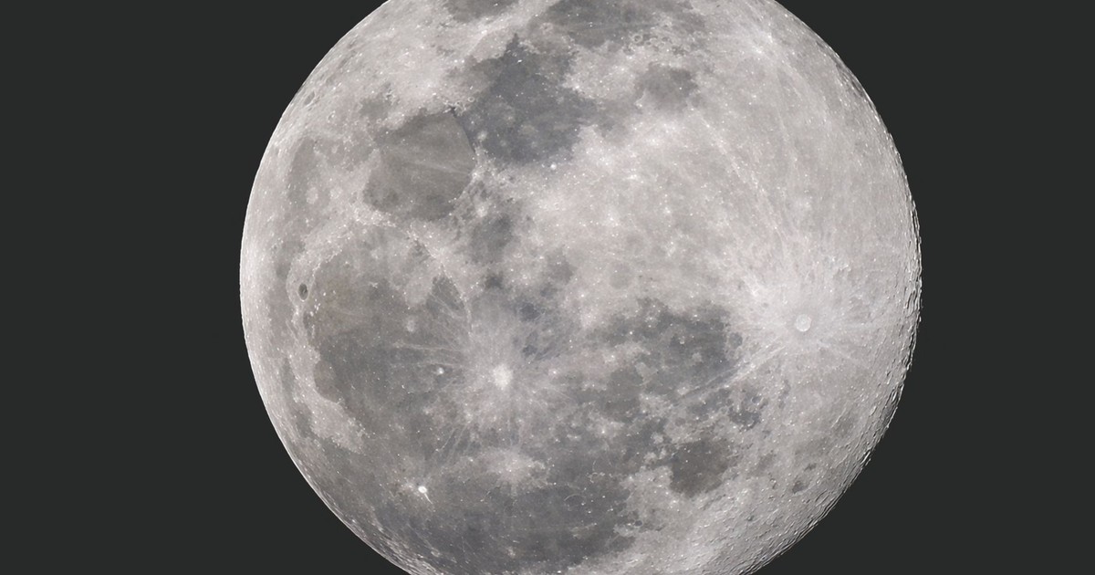 High-resolution image of the full moon showcasing visible craters and surface details.