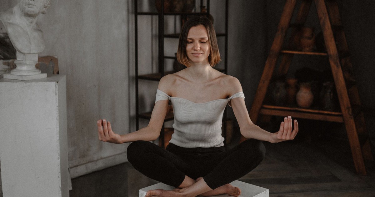 A serene moment of meditation captured in an artistic studio environment.