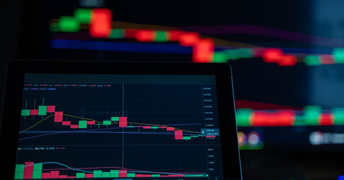 A close-up view of cryptocurrency trading charts showing a bearish trend in a digital market on a computer screen.