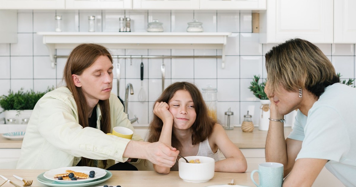Casual family breakfast in a bright kitchen setting, fostering togetherness.