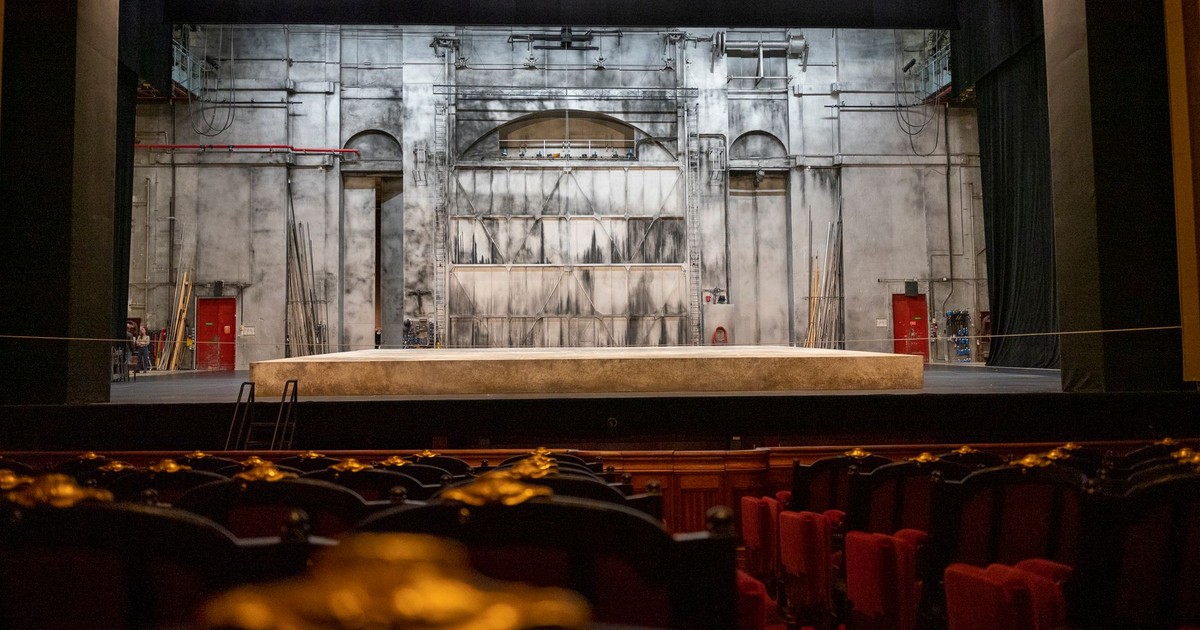 Empty theater stage with backdrop and seating in Paris, France.