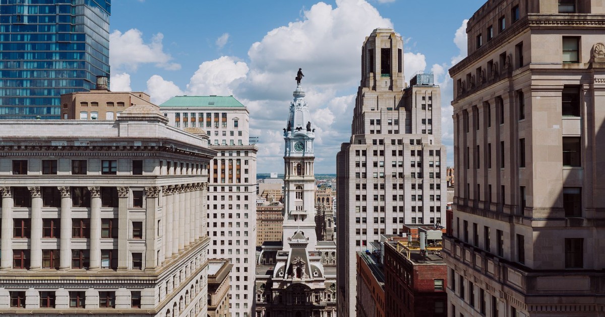 A stunning view of Philadelphia's skyline with the iconic City Hall in the center.