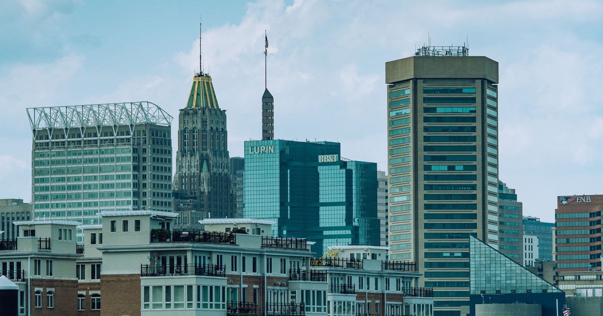 A vibrant view of Baltimore cityscape featuring iconic skyscrapers under a clear sky.