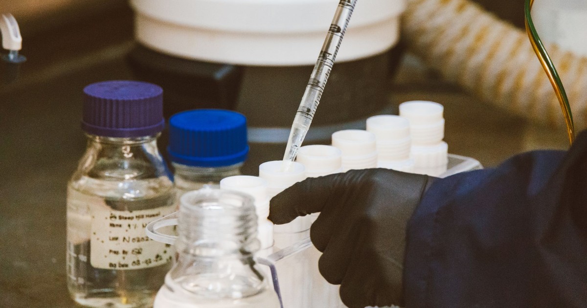 Detailed view of laboratory equipment and pipette in use, enhancing scientific research.