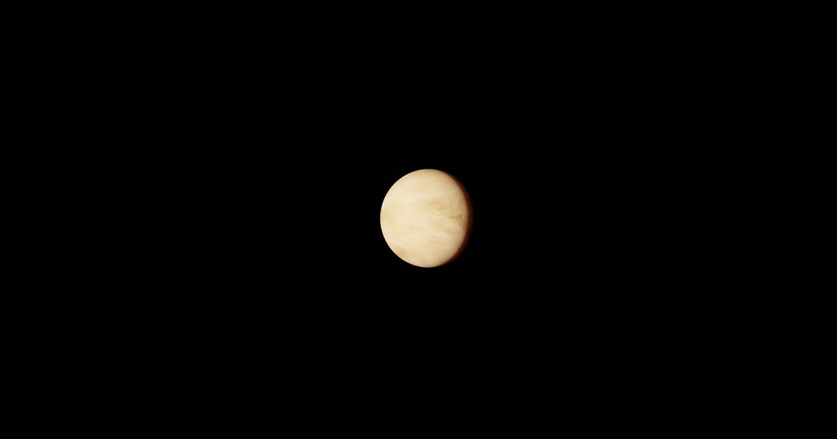 Image of planet Venus against a black space background, highlighting its atmospheric details.