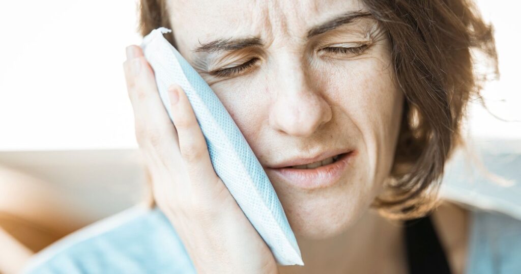 Everything to Know About Menopause Mouth Symptoms - Featured image
