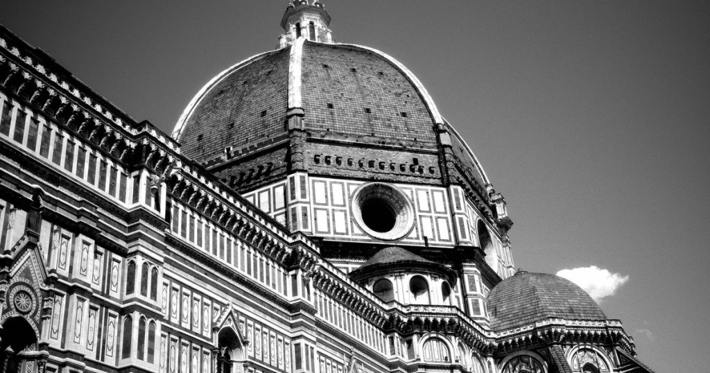 Stunning black-and-white photo of Florence Cathedral's dome, a masterpiece of architecture.