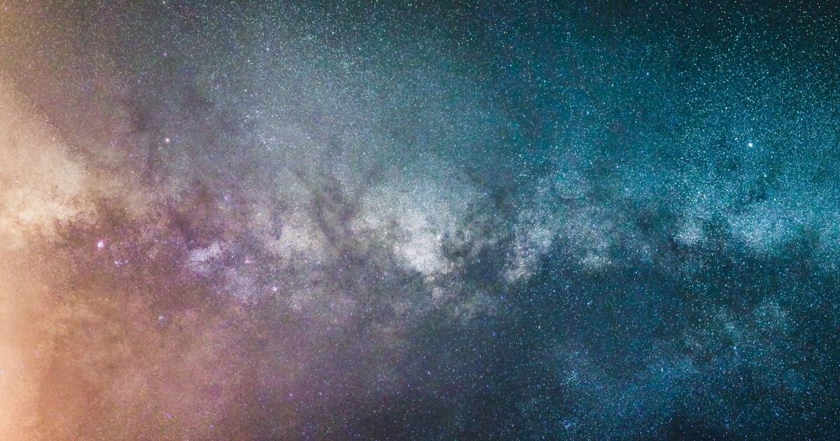 Stunning view of the Milky Way galaxy at night, showcasing countless stars and cosmic colors.
