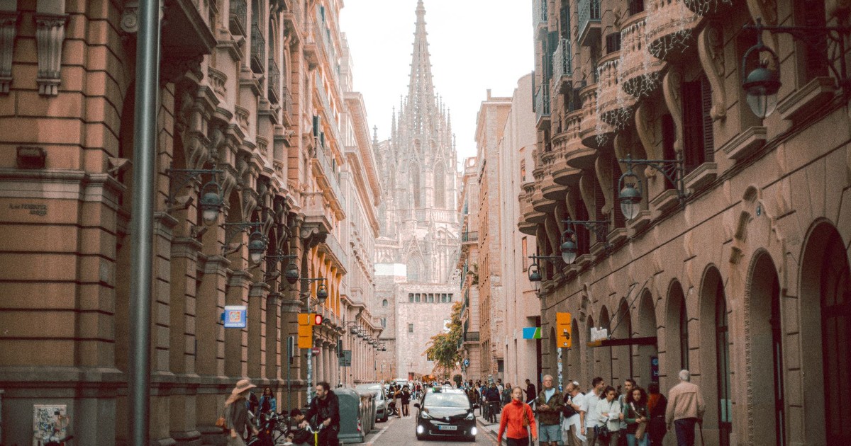 Street view in Barcelona's Gothic Quarter with cathedral.