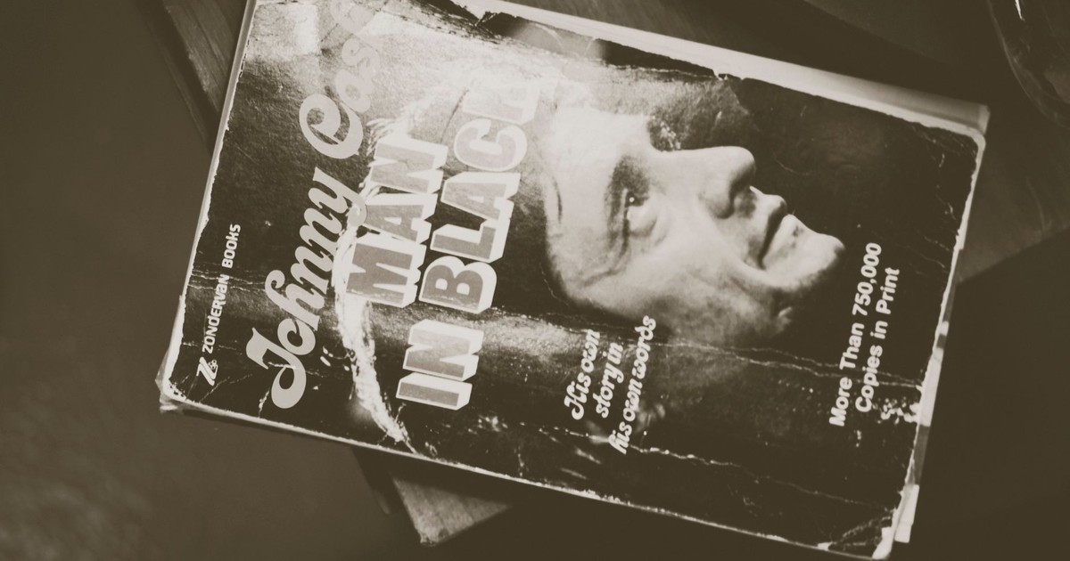Old book cover featuring biography of a legendary musician in sepia tone.