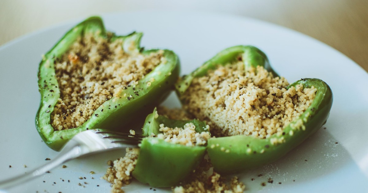 Delicious stuffed green bell pepper with couscous, perfect for a healthy vegetarian meal.
