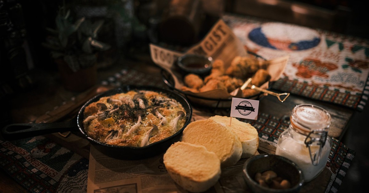 A warm, inviting rustic meal setup on a decorative tabletop, perfect for cozy gatherings.