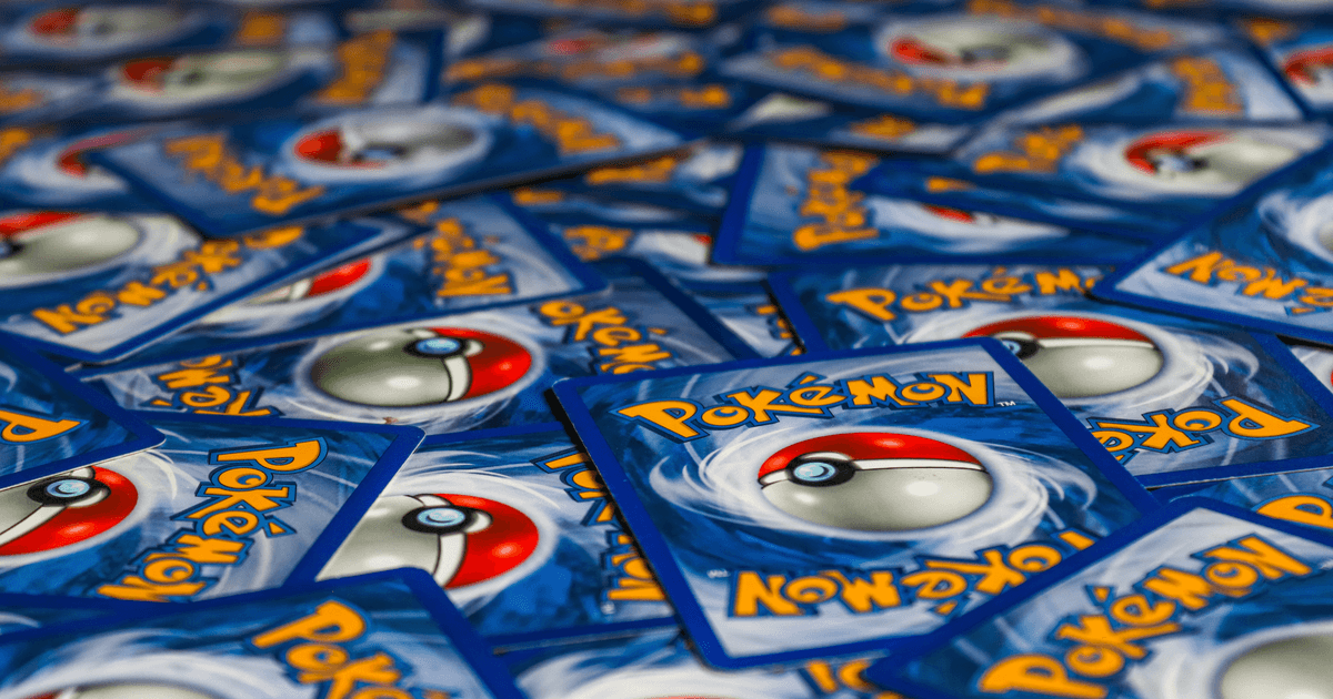 A vibrant display of Pokémon trading cards featuring the iconic Pokeball design.