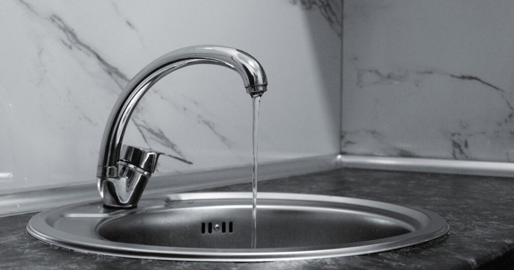 Why You Keep Getting Ants at the Kitchen Sink (And How to Stop Them) - Featured image